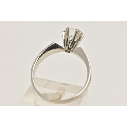 429 - A WHITE METAL DIAMOND SINGLE STONE RING, set with a round brilliant cut diamond, measuring approxima... 