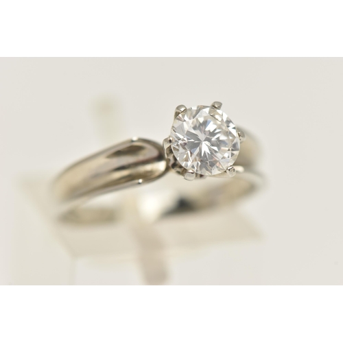 429 - A WHITE METAL DIAMOND SINGLE STONE RING, set with a round brilliant cut diamond, measuring approxima... 