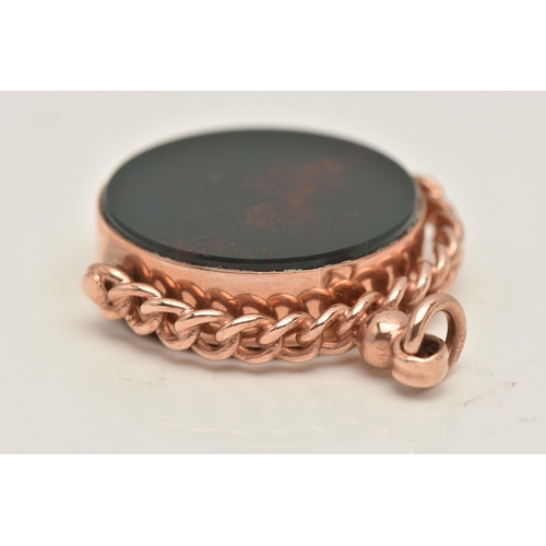 432 - A 9CT ROSE GOLD SWIVEL FOB, of a circular form, set with a bloodstone and carnelian inlay, hallmarke... 