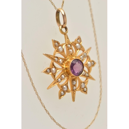 433 - A YELLOW METAL AMETHYST AND SEED PEARL PENDANT AND CHAIN, circular star shape pendant set with a cen... 