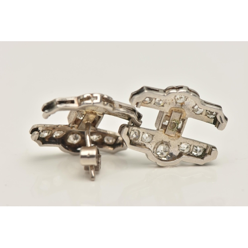 436 - A PAIR OF WHITE METAL DIAMOND SET EARRINGS, converted earrings from possible links, each set with a ... 