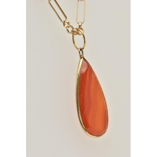 453 - A 9CT GOLD CARNELIAN PENDANT NECKLACE AND A RING, polished tear drop carnelian pendant collet set, f... 