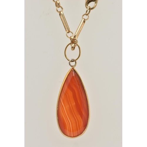 453 - A 9CT GOLD CARNELIAN PENDANT NECKLACE AND A RING, polished tear drop carnelian pendant collet set, f... 