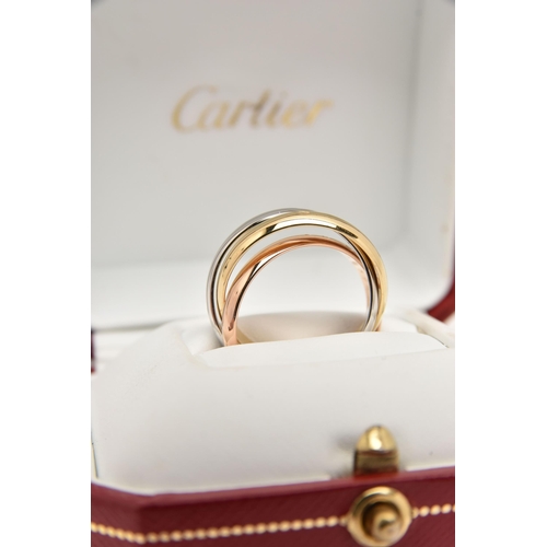 454 - A 'LES MUST DE CARTIER' TRINITY BAND, yellow, white and rose gold interlocking bands, singed 'Les Mu... 