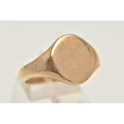 463 - A GENTS HEAVY 9CT GOLD SIGNET RING, of an oval polished form, to a polished band, hallmarked 9ct Bir... 