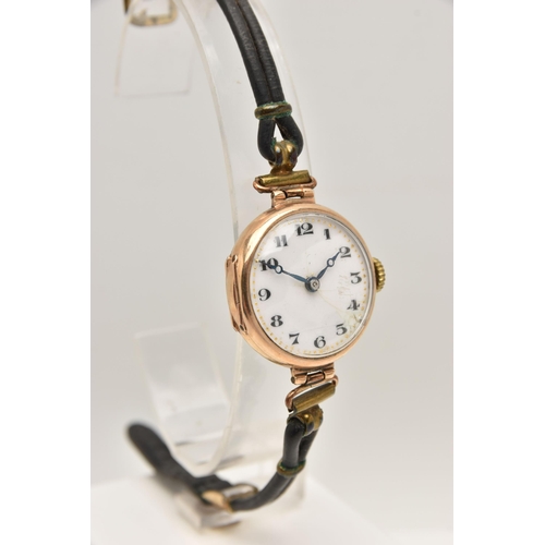 472 - AN EARLY 20TH CENTURY 9CT GOLD LADIES WRISTWATCH, manual wind, round white dial with Arabic numerals... 