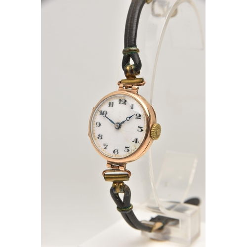 472 - AN EARLY 20TH CENTURY 9CT GOLD LADIES WRISTWATCH, manual wind, round white dial with Arabic numerals... 