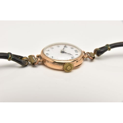 472 - AN EARLY 20TH CENTURY 9CT GOLD LADIES WRISTWATCH, manual wind, round white dial with Arabic numerals... 