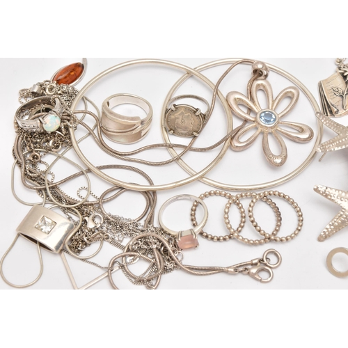 503 - AN ASSORTMENT OF WHITE METAL JEWELLERY, to include two white metal bangles, assorted necklaces and r... 