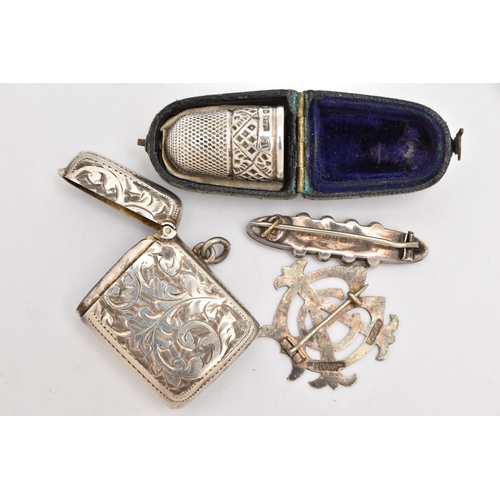 506 - A SMALL SELECTION OF SILVER ITEMS, to include a silver rectangular vesta case with foliate pattern a... 