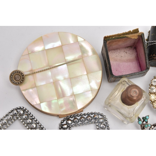 511 - A SMALL SELECTION OF ITEMS, to include a mother of pearl compact, a pair of imitation cut steel buck... 