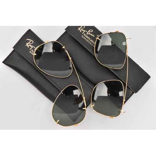 519 - TWO PAIRS OF 'RAY-BAN' CLIP ON SUNGLASSES, both with blue tinted lenses, both signed 'Ray-Ban' with ... 