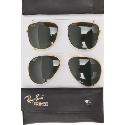 519 - TWO PAIRS OF 'RAY-BAN' CLIP ON SUNGLASSES, both with blue tinted lenses, both signed 'Ray-Ban' with ... 