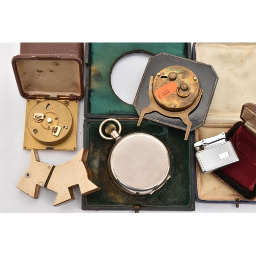 523 - AN ASSORTMENT OF ITEMS, to include a novelty Bakelite dog lighter, a cased Colibri lighter, an art d... 