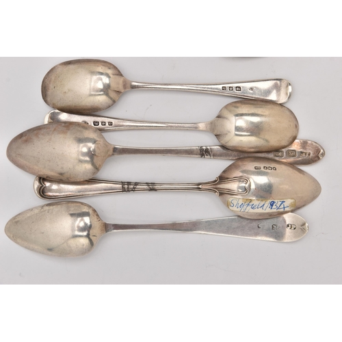 527 - AN ASSORTMENT OF SILVER TEASPOONS, to include four Hanoverian pattern teaspoons, two old English pat... 