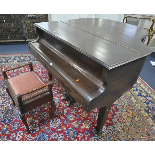 152 - A DANEMANN MAHOGANY CASED BABY GRAND PIANO, the hinged lid enclosing a cast iron over strung frame, ... 