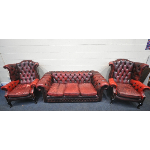 154 - A CHESTERFIELD OXBLOOD LEATHER BUTTON BACK THREE SEATER SOFA, length 190cm x depth 92cm x height 66c... 