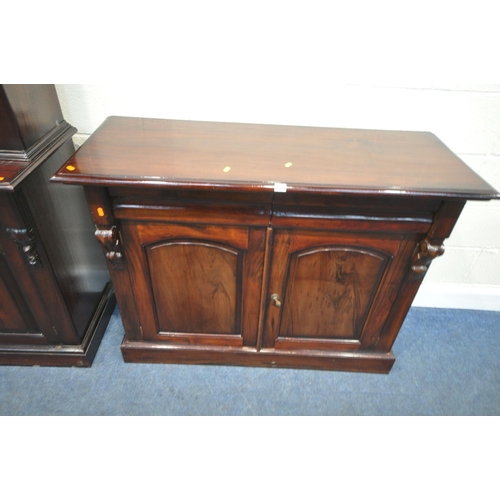 176 - A 20TH CENTURY MAHOGANY SIDEBOARD, fitted with two drawers, over double cupboard doors, width 122cm ... 