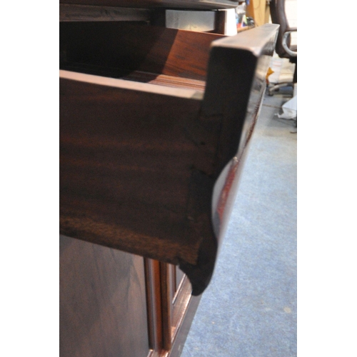 176 - A 20TH CENTURY MAHOGANY SIDEBOARD, fitted with two drawers, over double cupboard doors, width 122cm ... 