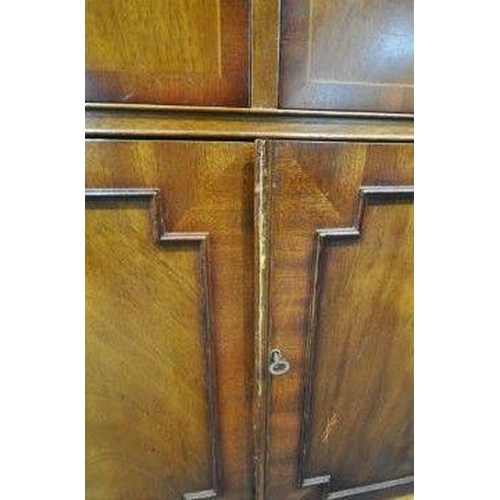 182 - A REPRODUCTION MAHOGANY BREAKFRONT SIDEBOARD, fitted with four drawers, above four cupboard doors, r... 