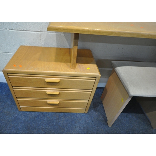 190 - A MODERN LIGHT OAK DESK, fitted with a three tier pull out section, and three drawers, width 166cm x... 