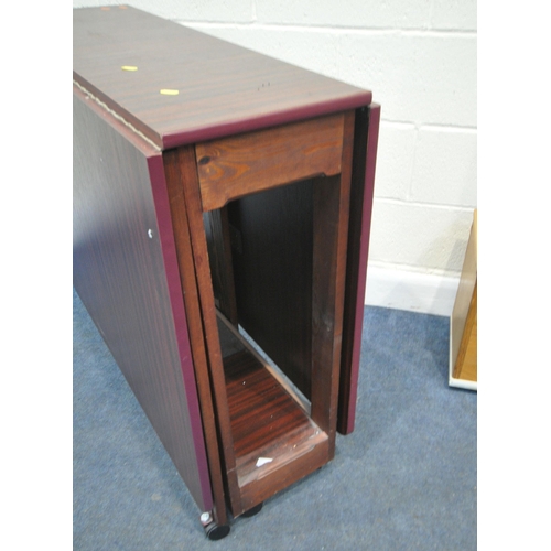 195 - A LARGE MAHOGANY EFFECT DROP LEAF TABLE, a long oak storage box, along with an open bookcase, condit... 