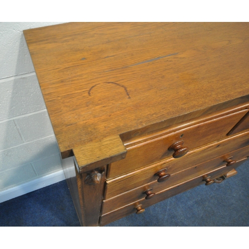 197 - A 19TH CENTURY OAK CHEST OF TWO SHORT OVER THREE LONG DRAWERS, with two foliate mounts, raised on tu... 