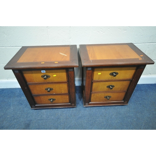 204 - AND SO TO BED, A PAIR OF MODEL PALAIS WALNUT AND CHERRY VENEER THREE DRAWER BEDSIDE CHESTS, width 59... 