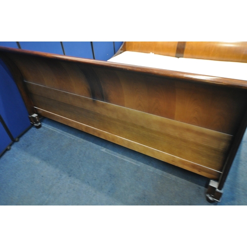 206 - AND SO TO BED, A MODEL PALAIS WALNUT AND CHERRY VENEER LARGE EMPEROR SLEIGH BED, with dipped side ra... 