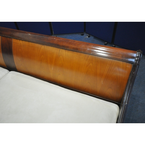 206 - AND SO TO BED, A MODEL PALAIS WALNUT AND CHERRY VENEER LARGE EMPEROR SLEIGH BED, with dipped side ra... 