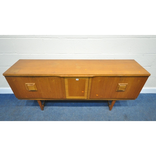 208 - A MID CENTURY TEAK SIDEBOARD, fitted with two bi-fold doors, flanking a central door, with articulat... 