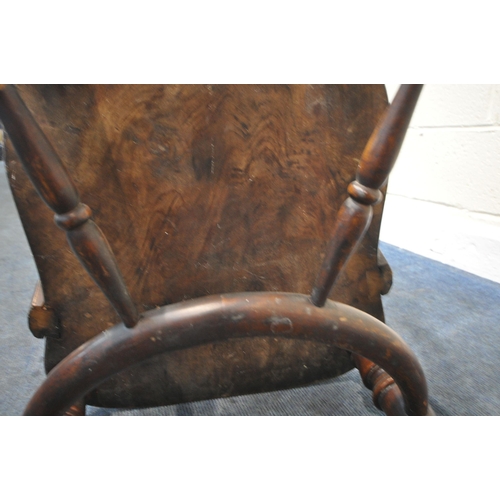 212 - A 19TH CENTURY WALNUT ARMCHAIR, with a deep dished seat, swept open armrests, raised on turned and t... 