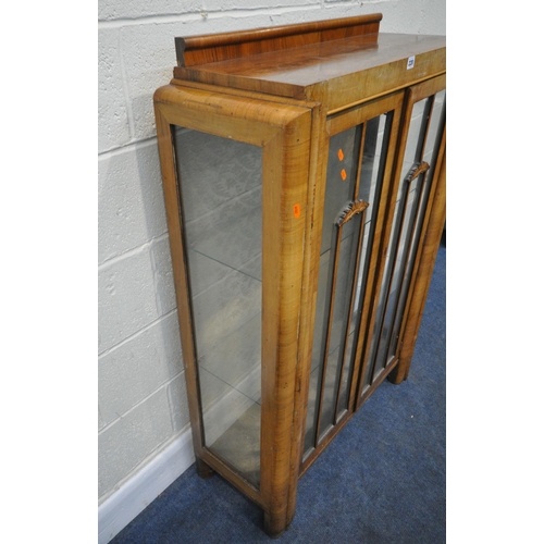 220 - A 20TH CENTURY WALNUT DISPLAY CABINET, with double glazed doors, enclosing two glass shelves, width ... 