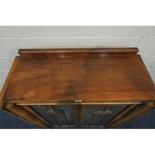 220 - A 20TH CENTURY WALNUT DISPLAY CABINET, with double glazed doors, enclosing two glass shelves, width ... 