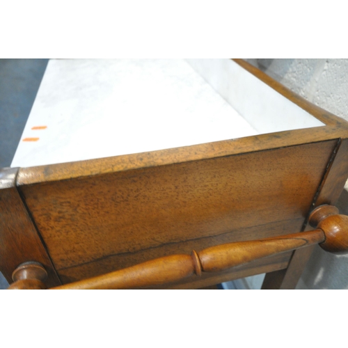 236 - A 19TH CENTURY FRENCH WALNUT WASHSTAND, with a small circular mirror fixed to the back, raised back ... 