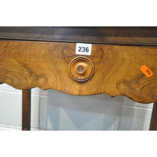 236 - A 19TH CENTURY FRENCH WALNUT WASHSTAND, with a small circular mirror fixed to the back, raised back ... 