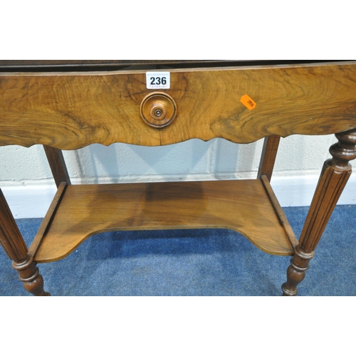 236 - A 19TH CENTURY FRENCH WALNUT WASHSTAND, with a small circular mirror fixed to the back, raised back ... 