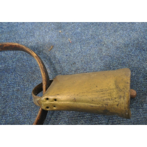 239 - A BRASS CATTLE / COW BELL, with a bentwood collar, condition report: historical wear and usage