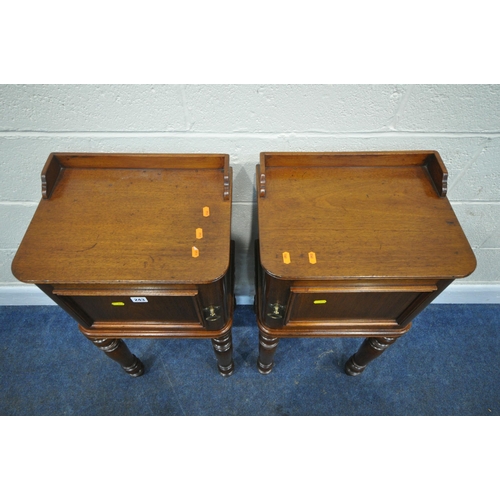 243 - AN OPPOSING PAIR OF VICTORIAN MAHOGANY BEDSIDE CABINETS, with raised back and sides, the single door... 