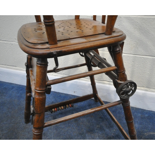 245 - A 20TH CENTURY OAK METAMORPHIC HIGH CHAIR, with open armrests, and a fold away foot rest, height 97c... 