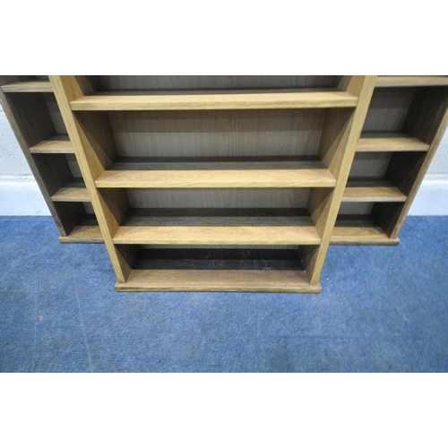 255 - THREE MATCHING OAK SHELVING UNITS, each with five shelves, width 56cm x depth 17cm x height 96cm, co... 