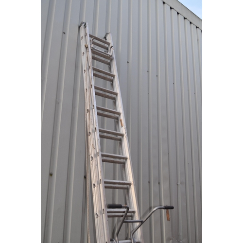 12 - AN ALUMINIUM DOUBLE EXTENSION LADDER, with 15 rungs to each length, and a clima ladder stay (2)