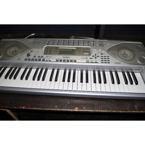 52 - A CASIO CTK-900 ELECTRONIC KEYBOARD with footswitch and stand (NO POWER SUPPLY SO UNTESTED)