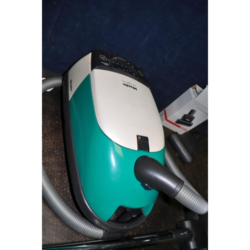 61 - A MIELE WHITE PEARL VACUUM CLEANER with boxed turbo mini head (PAT pass and working)