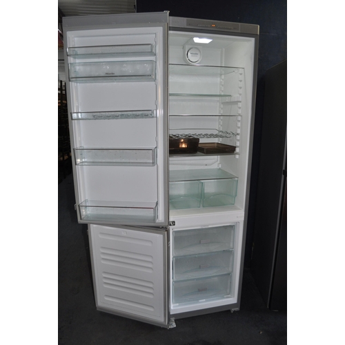 66 - A MIELE TALL FRIDGE FREEZER with stainless steel doors, width 60cm, depth 61cm, hight 201cm (PAT pas... 