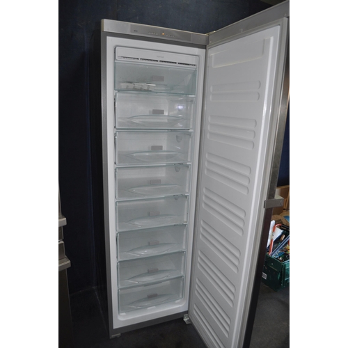 67 - A MIELE LARDER FREEZER with stainless steel door, width 60cm, depth 61cm, height 1856cm (PAT pass an... 