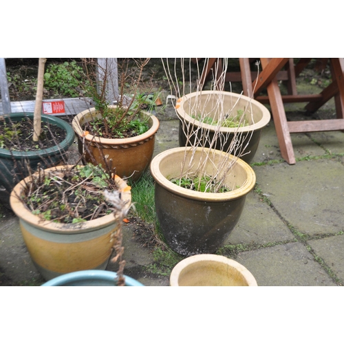 9 - A SELECTION OF PLANT POTS, including glazed and terracotta (12)