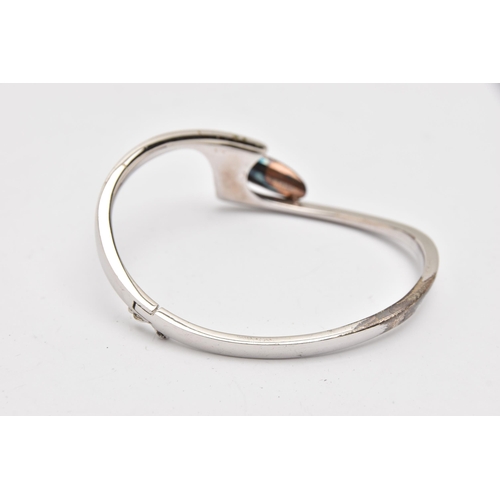 500 - A SILVER 'BREUNING' BANGLE, a silver hinged bangle, with oxidized detail, signed 'Breunning', hallma... 