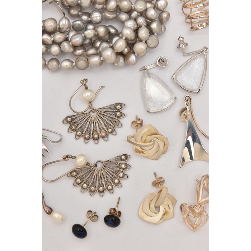 502 - AN ASSORTMENT OF WHITE METAL EARRINGS AND A BRACELET, to include a pair of white metal drop earrings... 