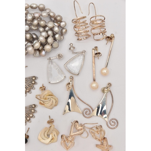 502 - AN ASSORTMENT OF WHITE METAL EARRINGS AND A BRACELET, to include a pair of white metal drop earrings... 